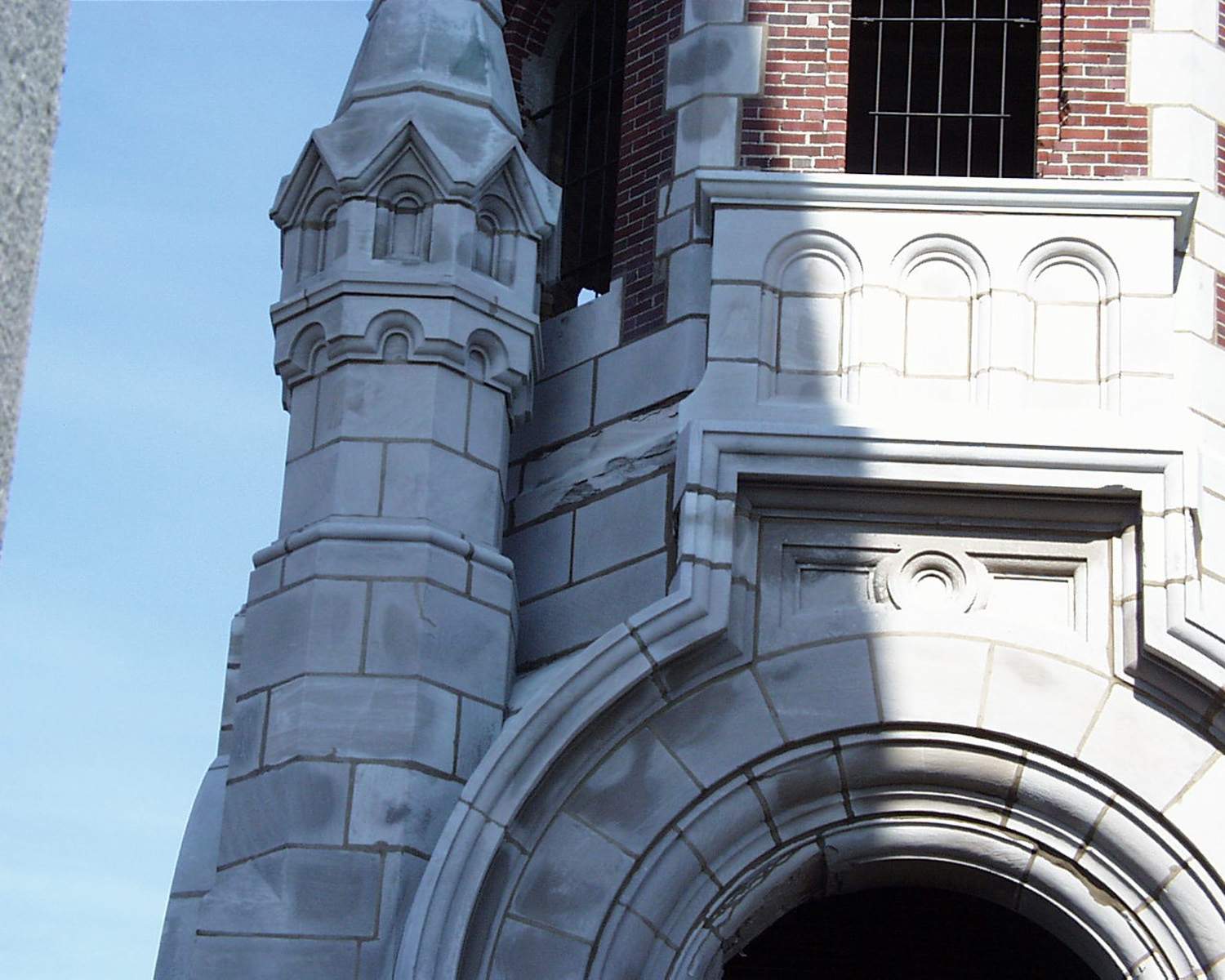 Holy Hill building restoration - West tower stone damage above bells copy